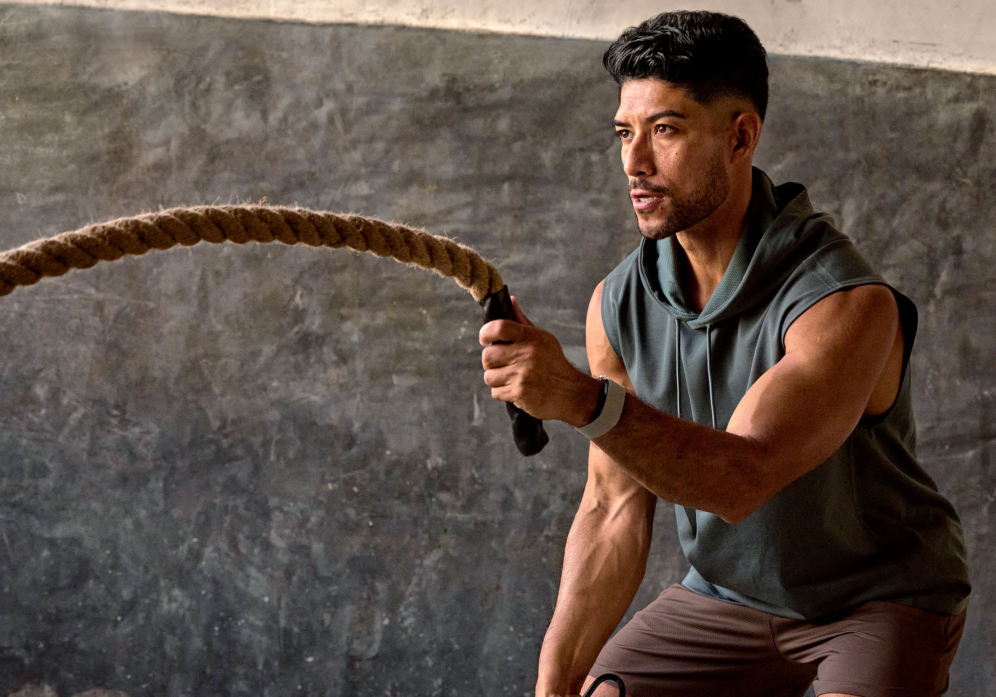 Athlete training while wearing the Garmin CIRQA Smart Band