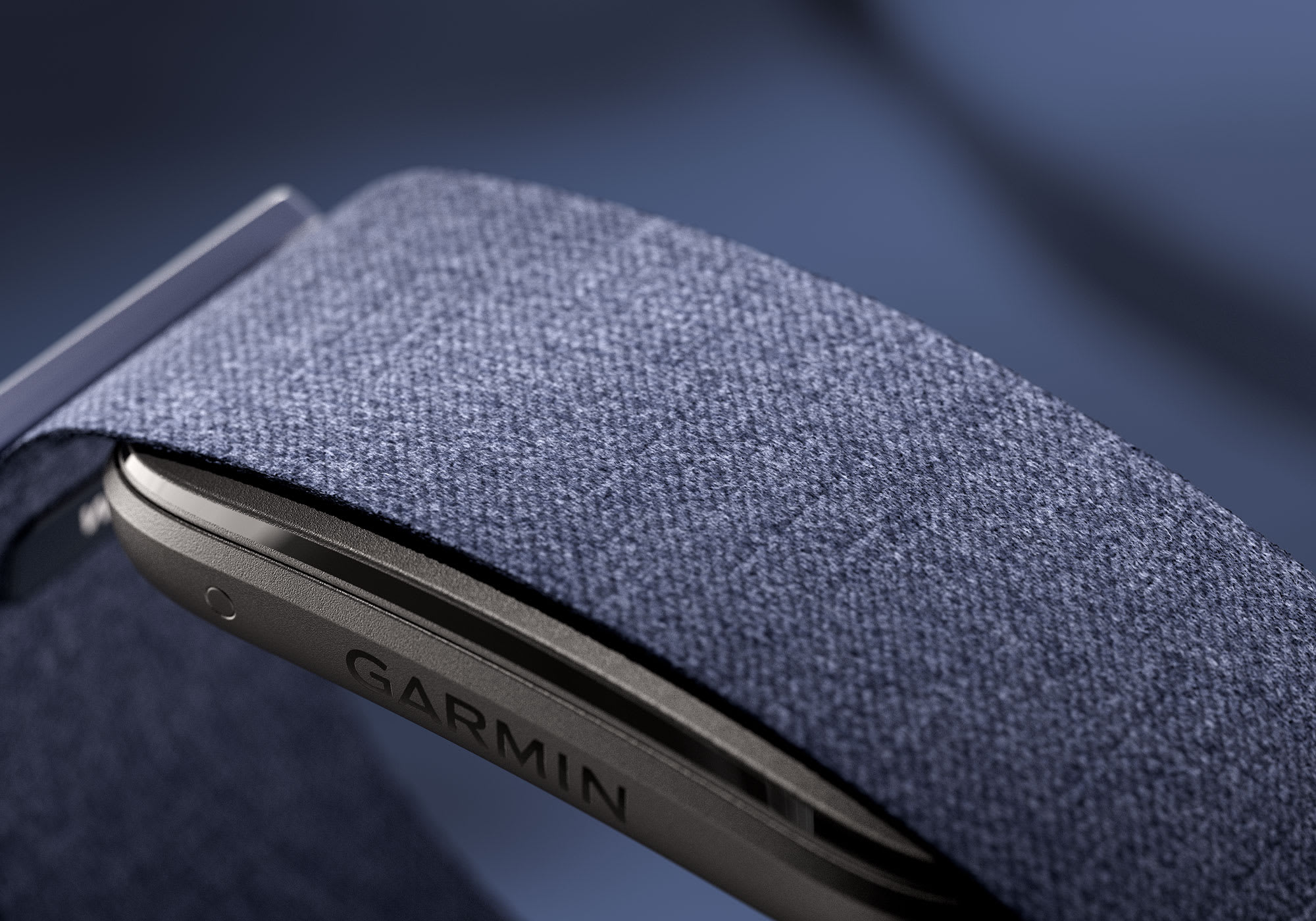 Close-up of Garmin CIRQA Smart Band fabric strap and module