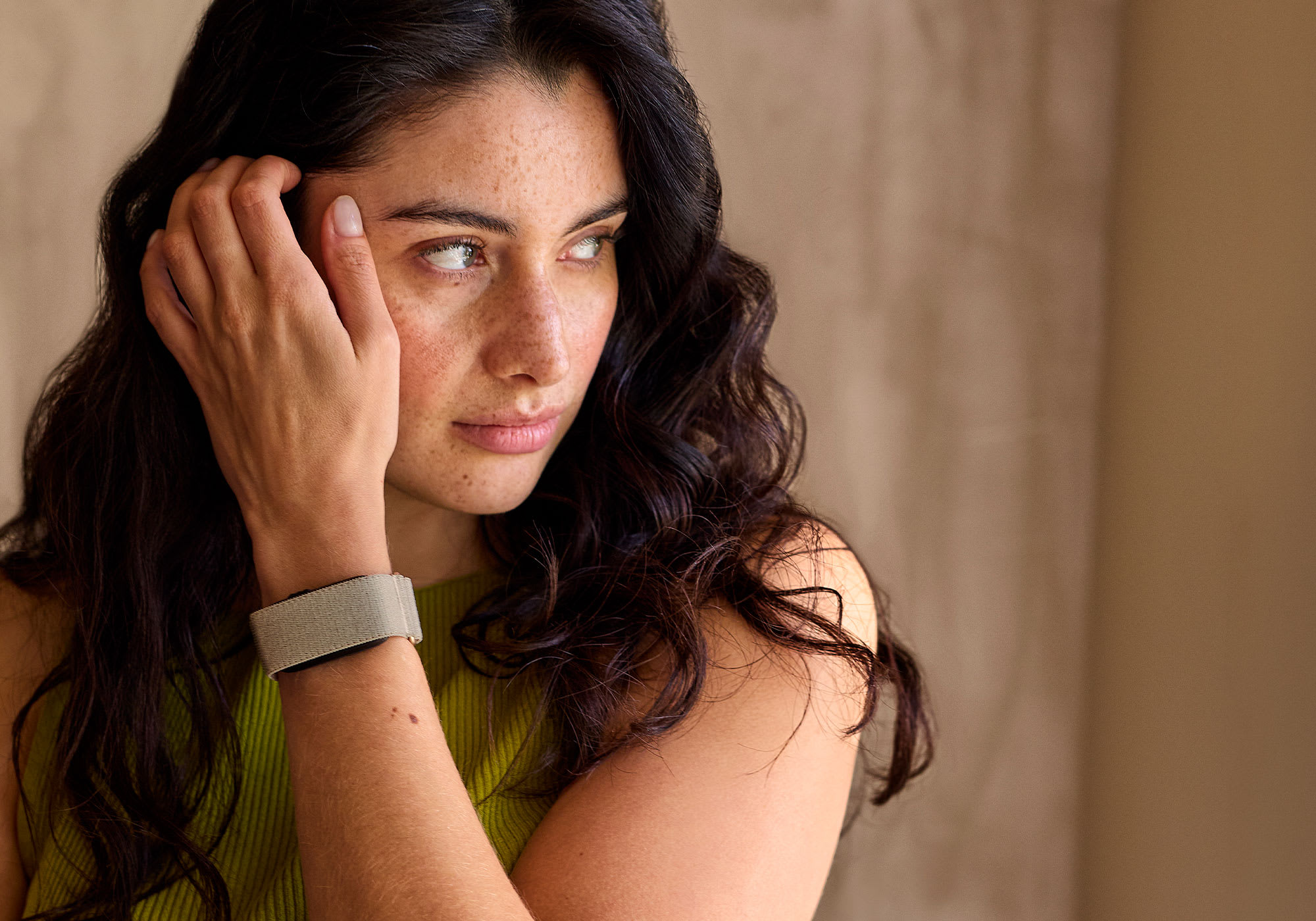 Woman wearing the discreet Garmin CIRQA Smart Band
